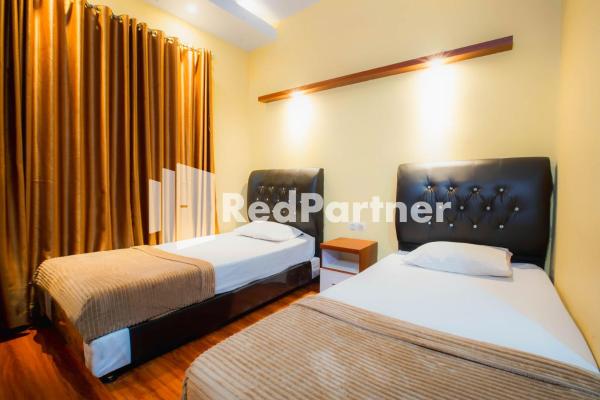 Hatta Guest House, Reservar Casa de hóspedes Jambi Jambi