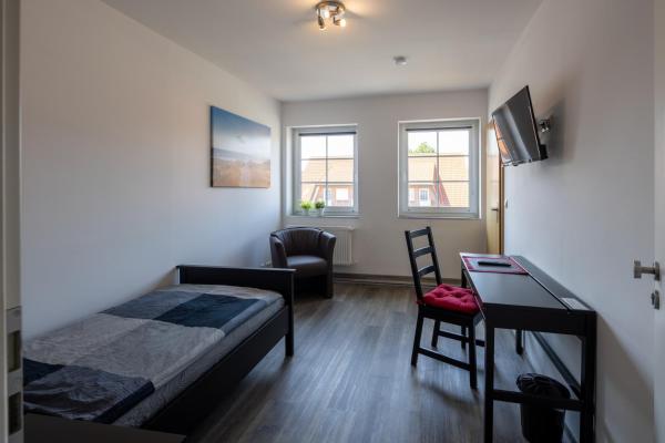 Gästehaus Olympia Wilhelmshaven - Moderne Einzelzimmer mit eigenem Bad für Monteure, Reservar Apartamento Schortens Friesland