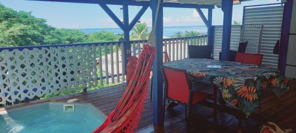 Le Colibri, belle vue mer, plage accés direct à 150m, piscinette privé, Reservar  Bouillante Basse Terre