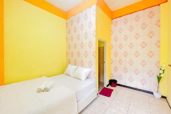 Sion Homestay Mitra RedDoorz near Terminal Kertajaya Mojokerto, Reservar Hotel Brangkal East Java