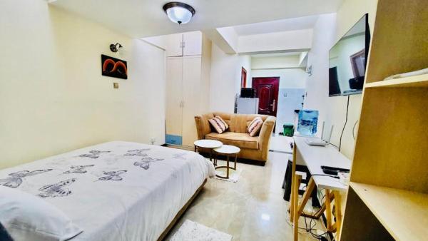 luxurious fully furnished two bedroom apartment with amazing city views heated swimming pool fully equipped gym with a child play area and ample parking space, Reservar Apartamento Hotéis em Nairobi com Estacionamento, Estacionamento