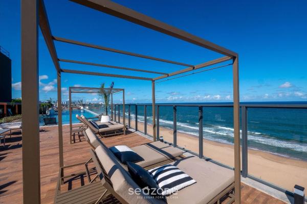 Prédio à beira-mar c/ Piscina e academia - ARUs, Reservar  Hotéis em Bahia com Piscina, Piscina