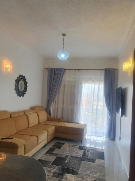 Two Bedrooms Apartment, located between kajjansi and kitende, with one bathroom, a living room, fully furnished kitchen, patio, free wifi, free parking space, Reservar Apartamento Kajansi Busiiro